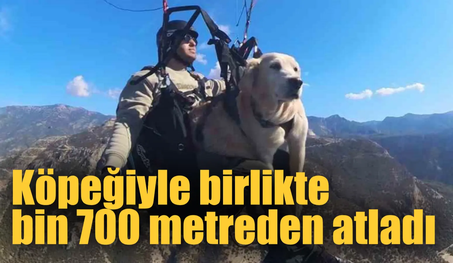 Köpeğiyle birlikte bin 700 metreden atladı